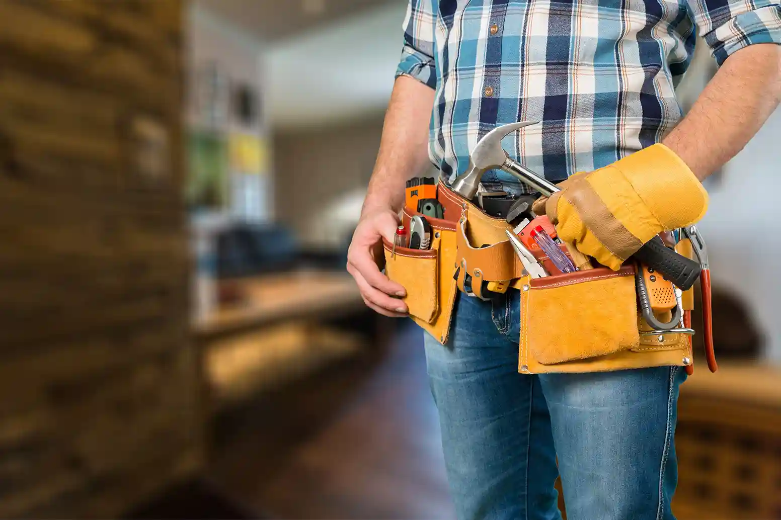 Handyman with tool belt ready for service work